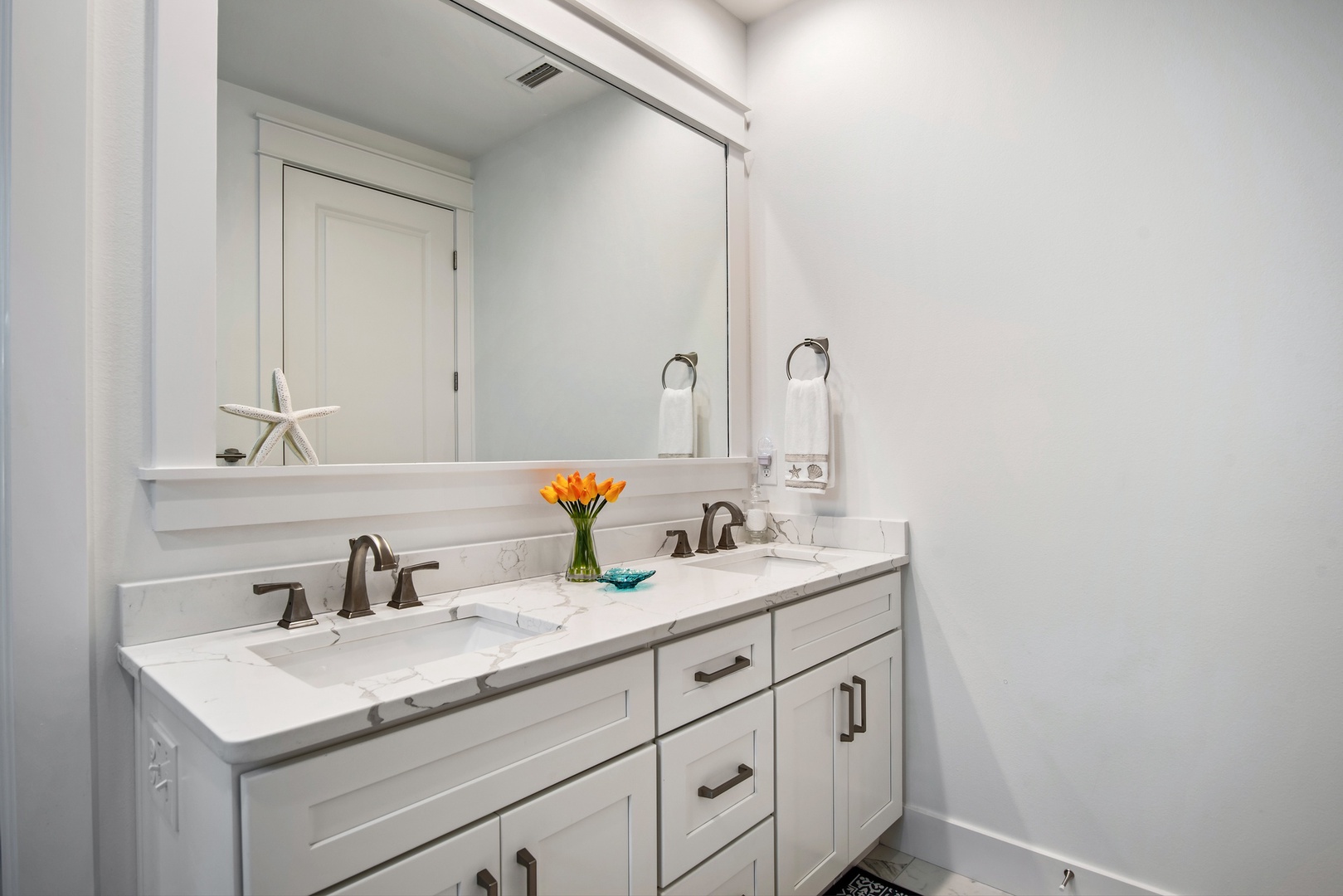 The master bathroom includes dual vanities for plenty of space!