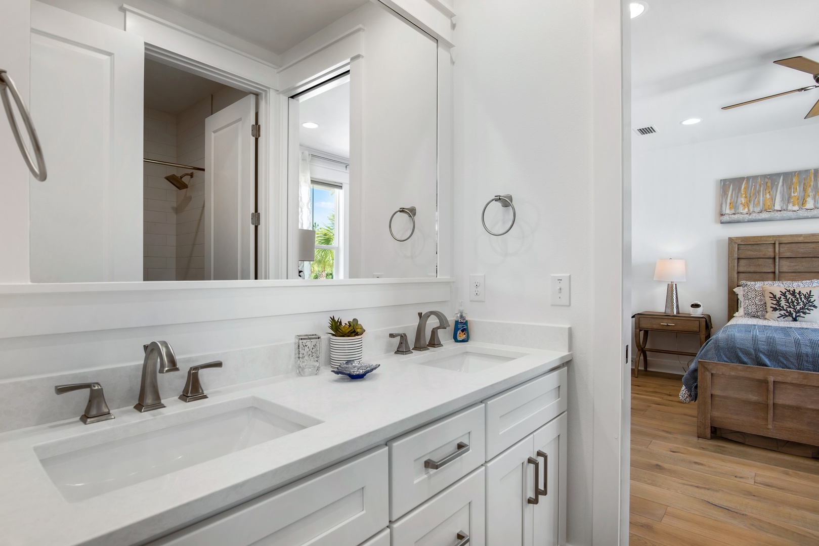 The first and second bedrooms share a Jack-n-Jill bathroom with dual vanities and tub/shower combo!