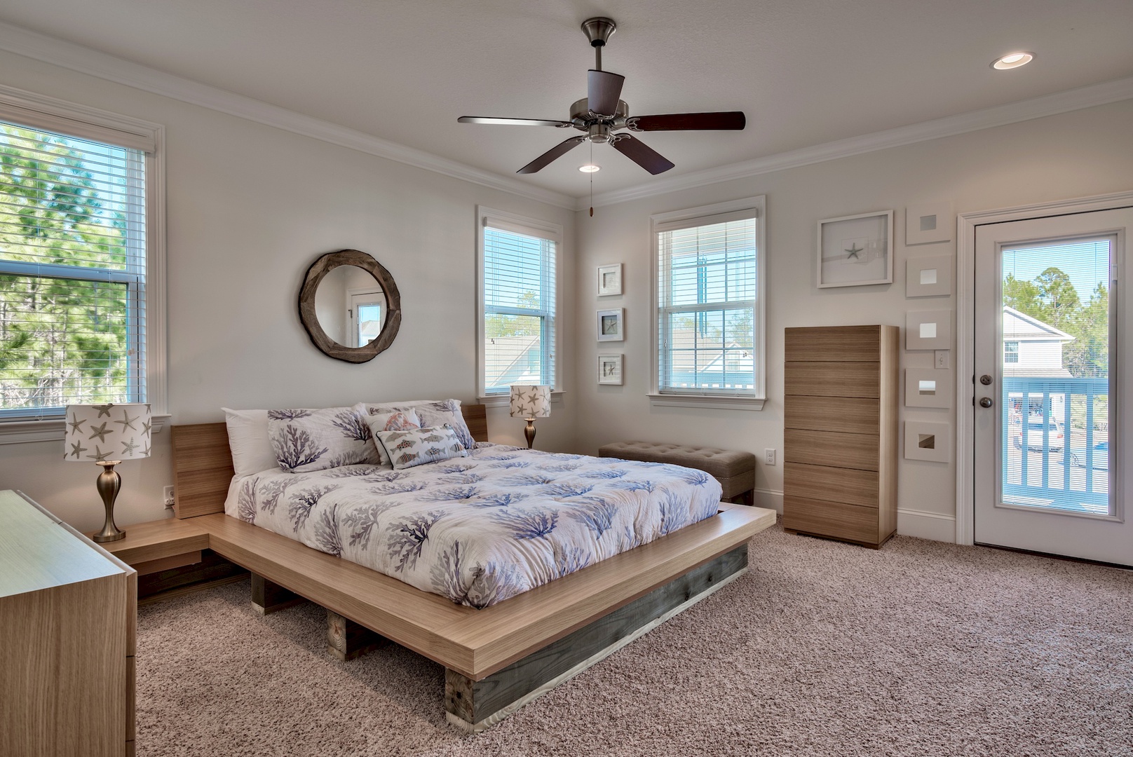 The master bedroom features a king-size platform bed, private bathroom, and private balcony!