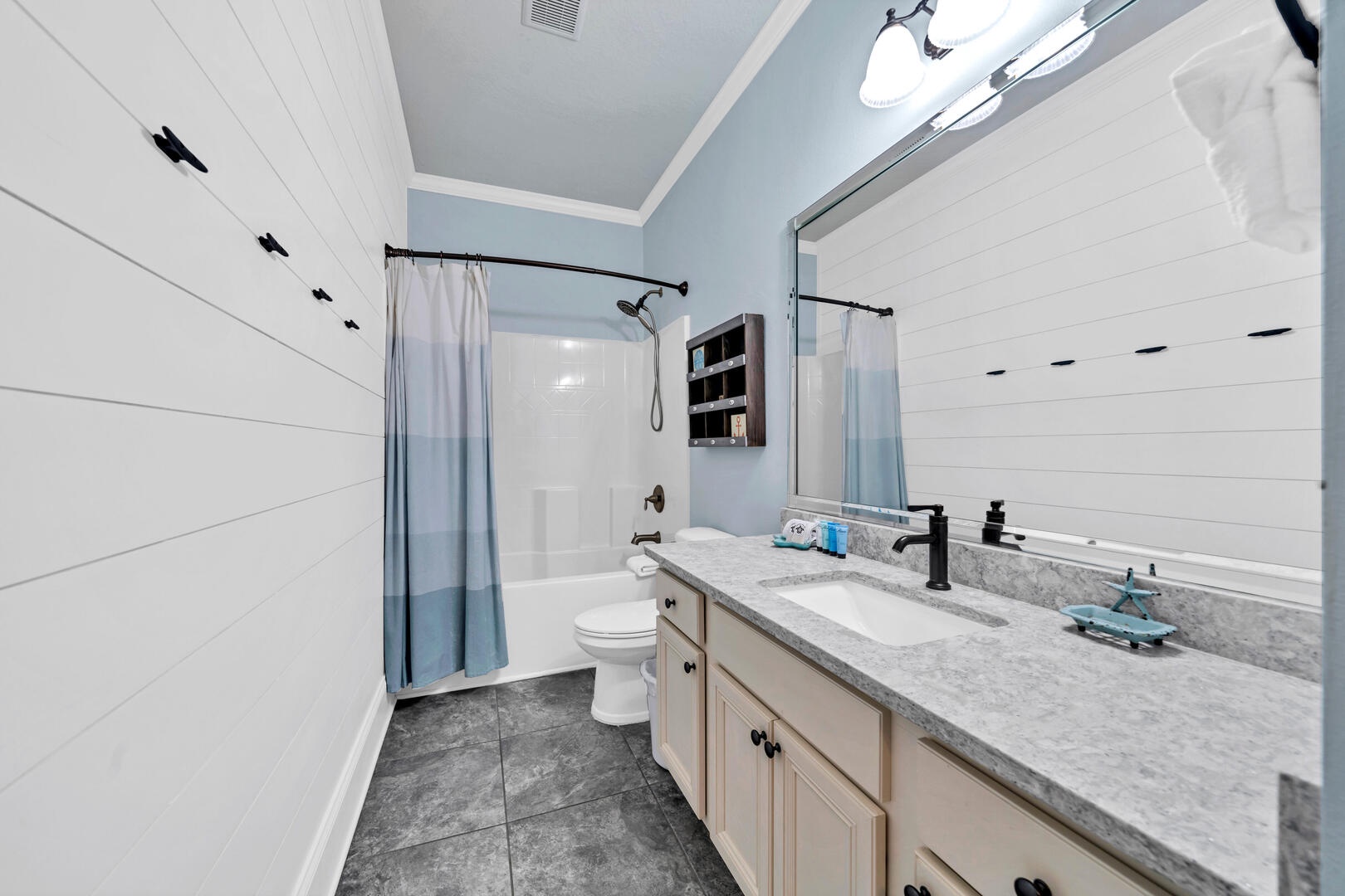The hall bathroom is conveniently located for the guest and bunk rooms!