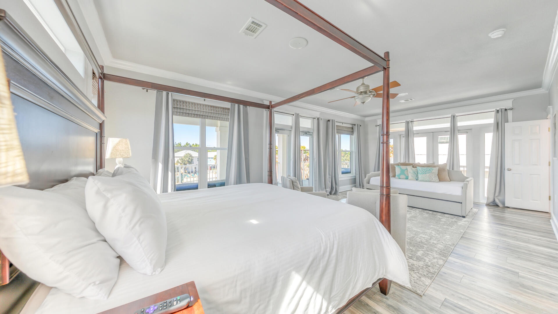 The 3rd floor master suite includes a king size bed and a huge balcony overlooking the pool!