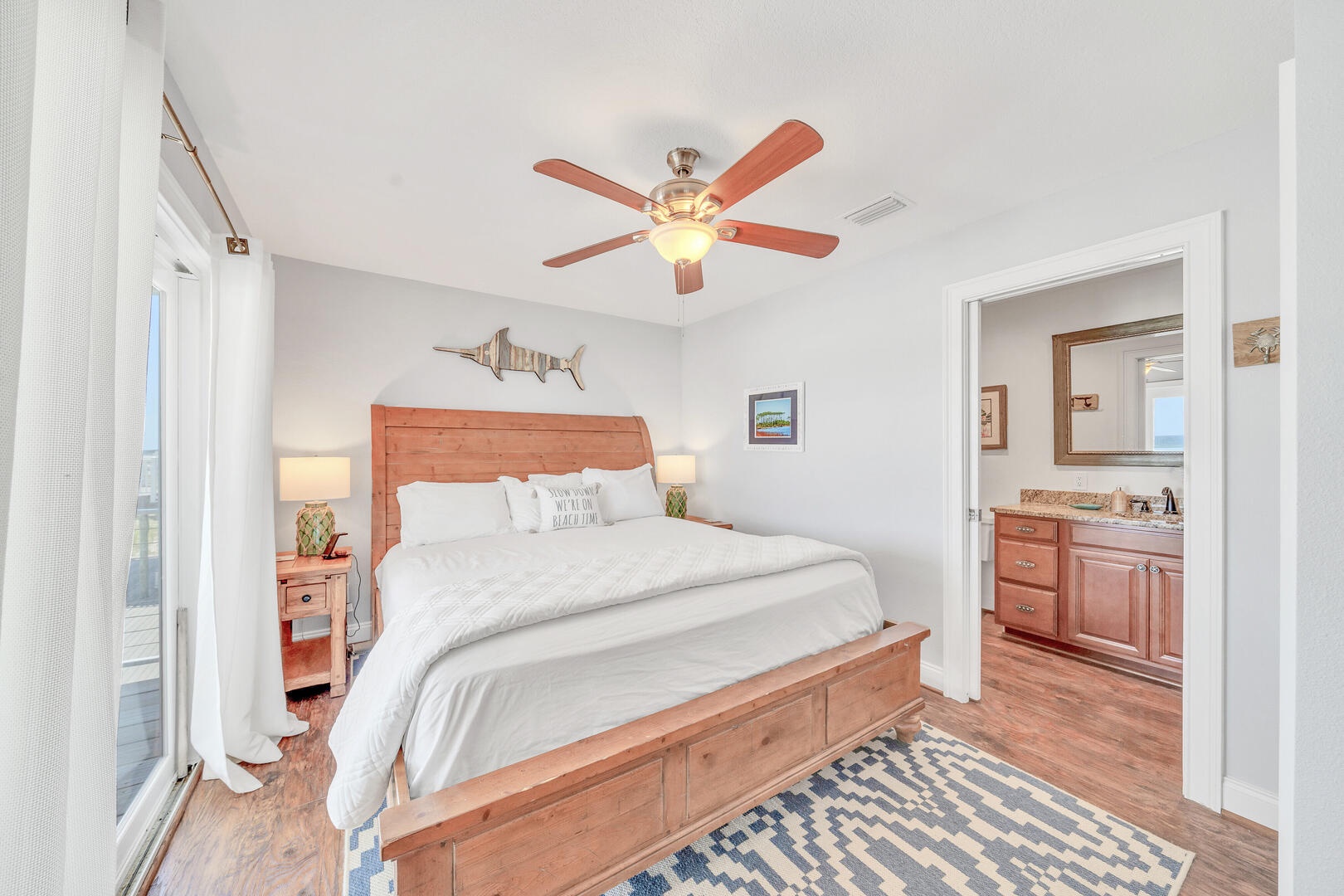 The master bedroom features a king size bed, private bathroom, and Gulf views!
