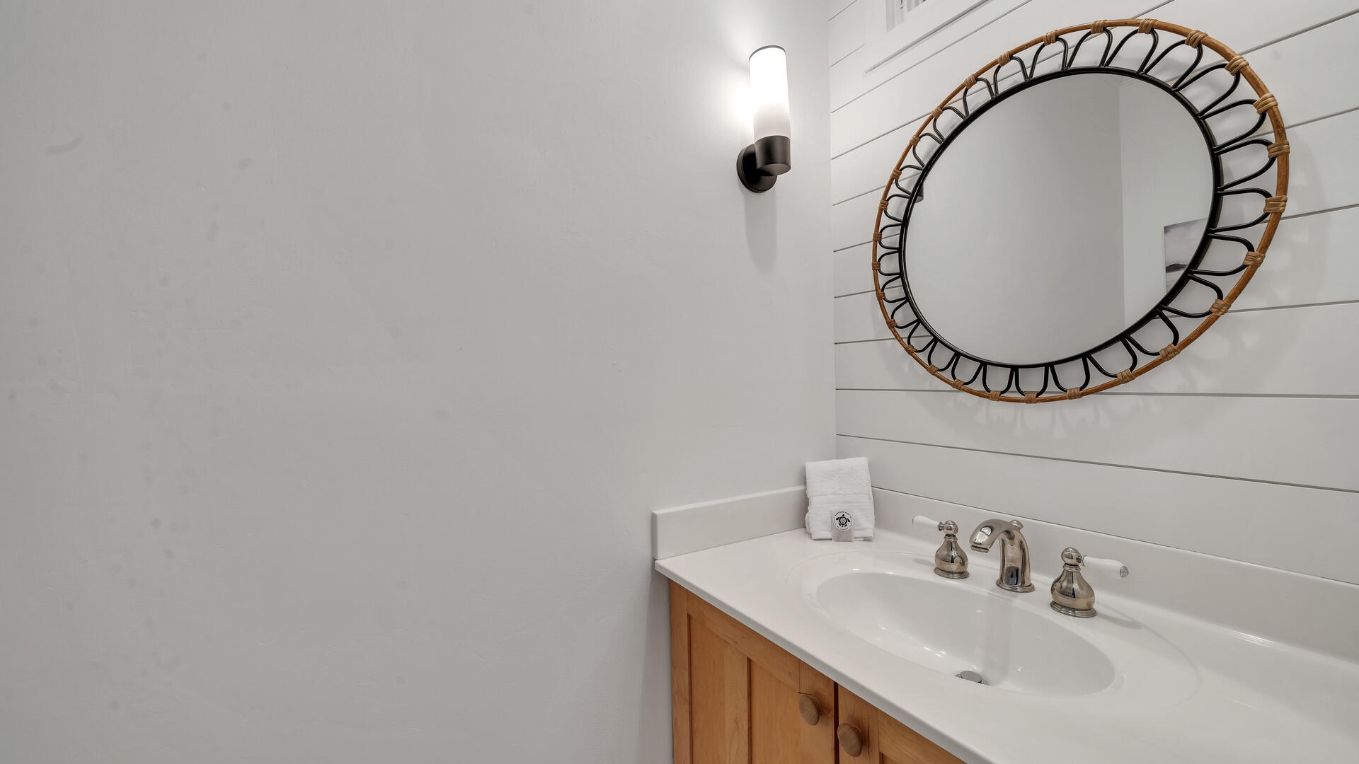A convenient half-bath is located just off the main living space!