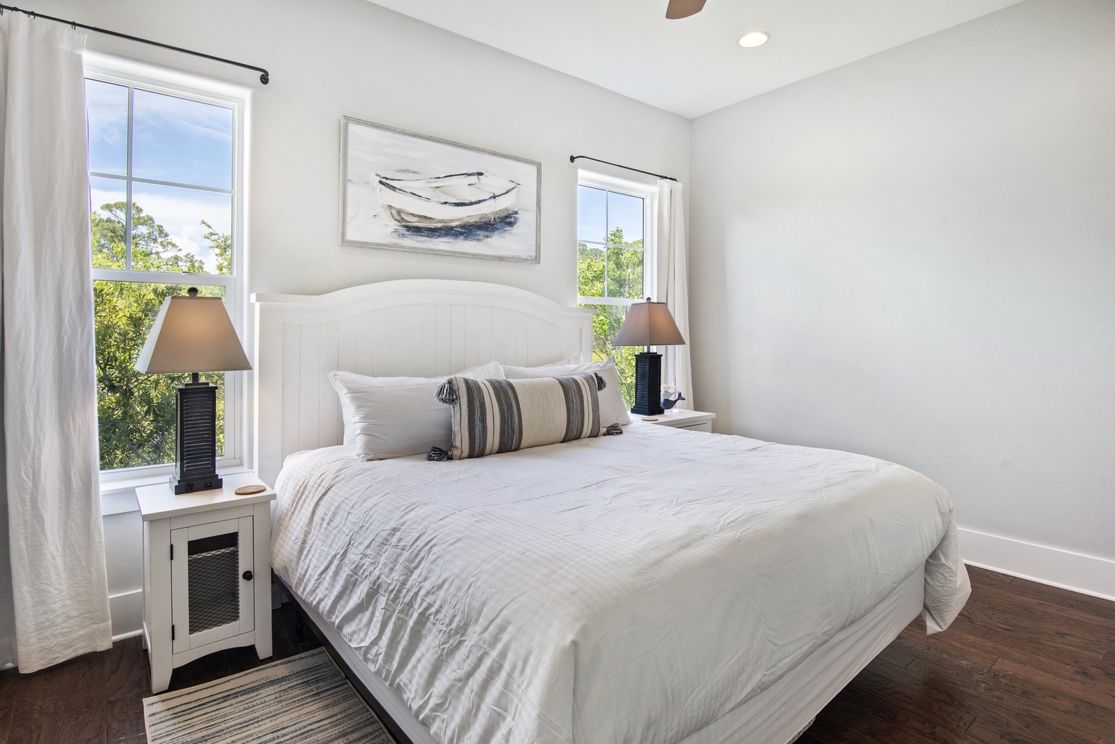 The master bedroom features a king-size bed and private bathroom!