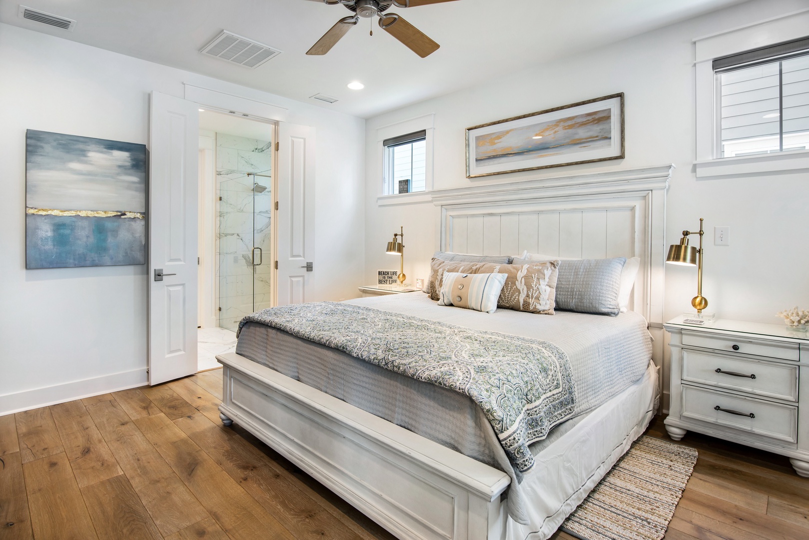 The ground floor master bedroom features a king size bed and pool views!