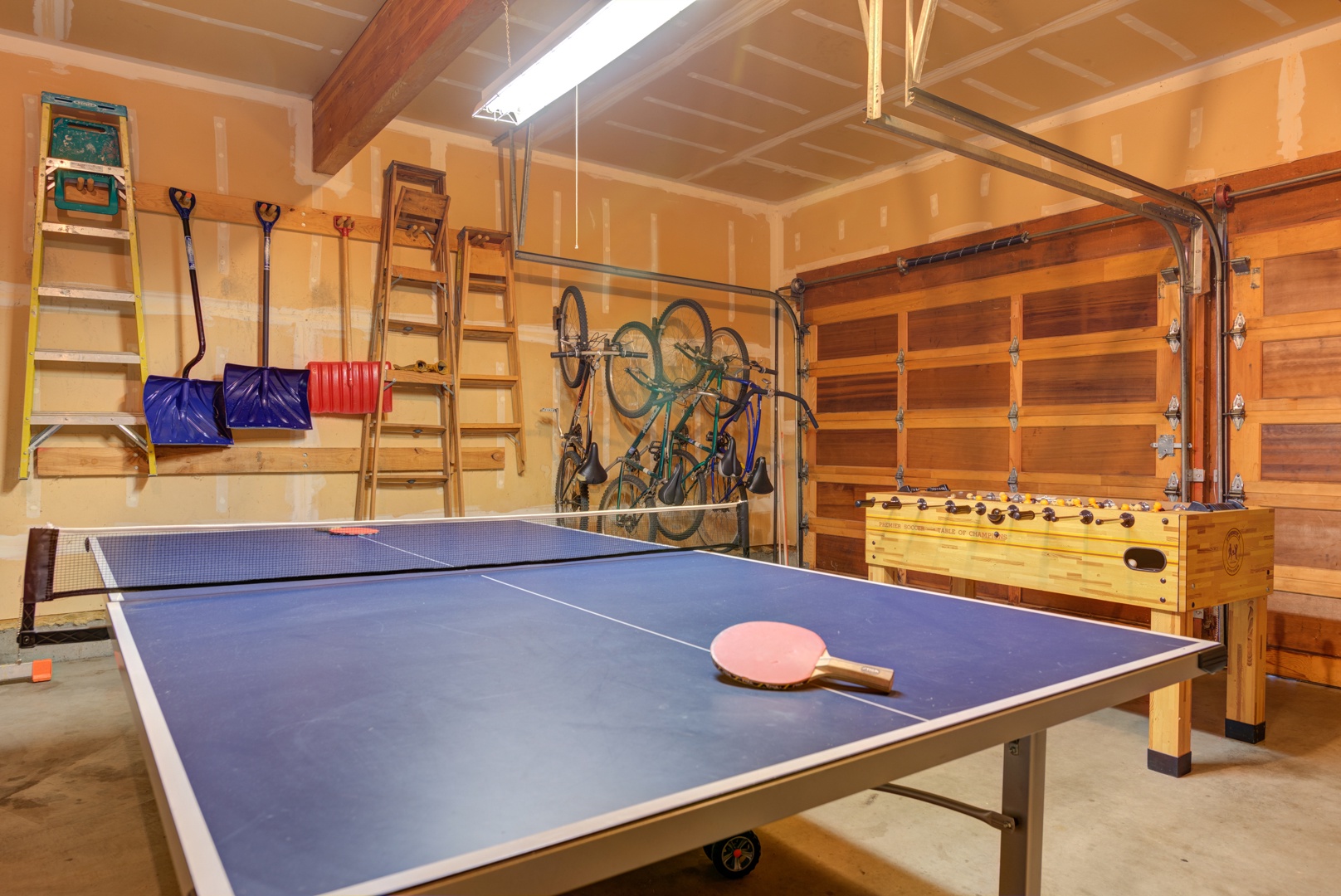 Ping pong table, foosball and bikes available for guest use in garage