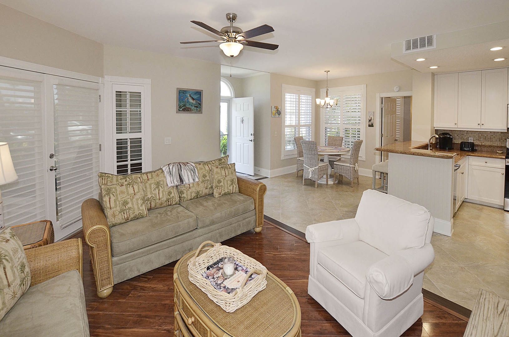 Entry / Living / Kitchen / Dining. Your open-concept sanctuary blends living, dining, and kitchen seamlessly. Sink into coastal comfort while enjoying home-cooked meals and peaceful moments.