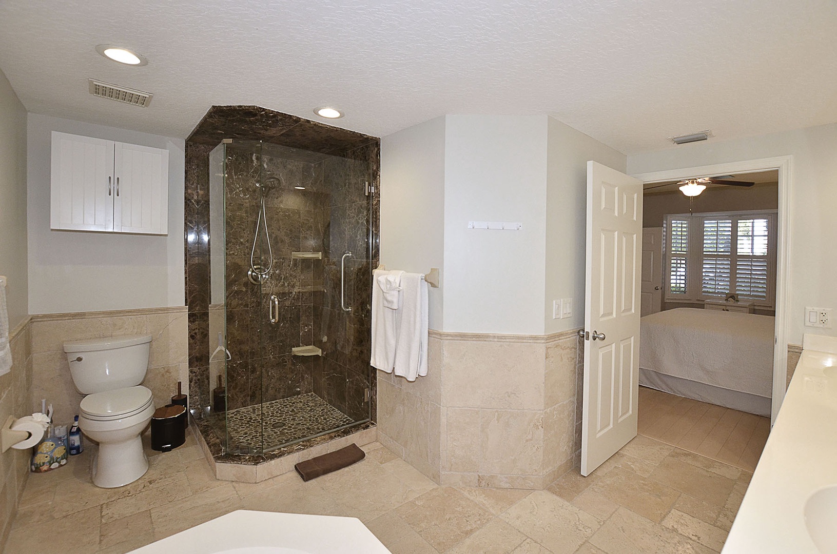 Your luxurious ensuite awaits with a stunning marble shower, elegant finishes, and thoughtful details for ultimate relaxation.