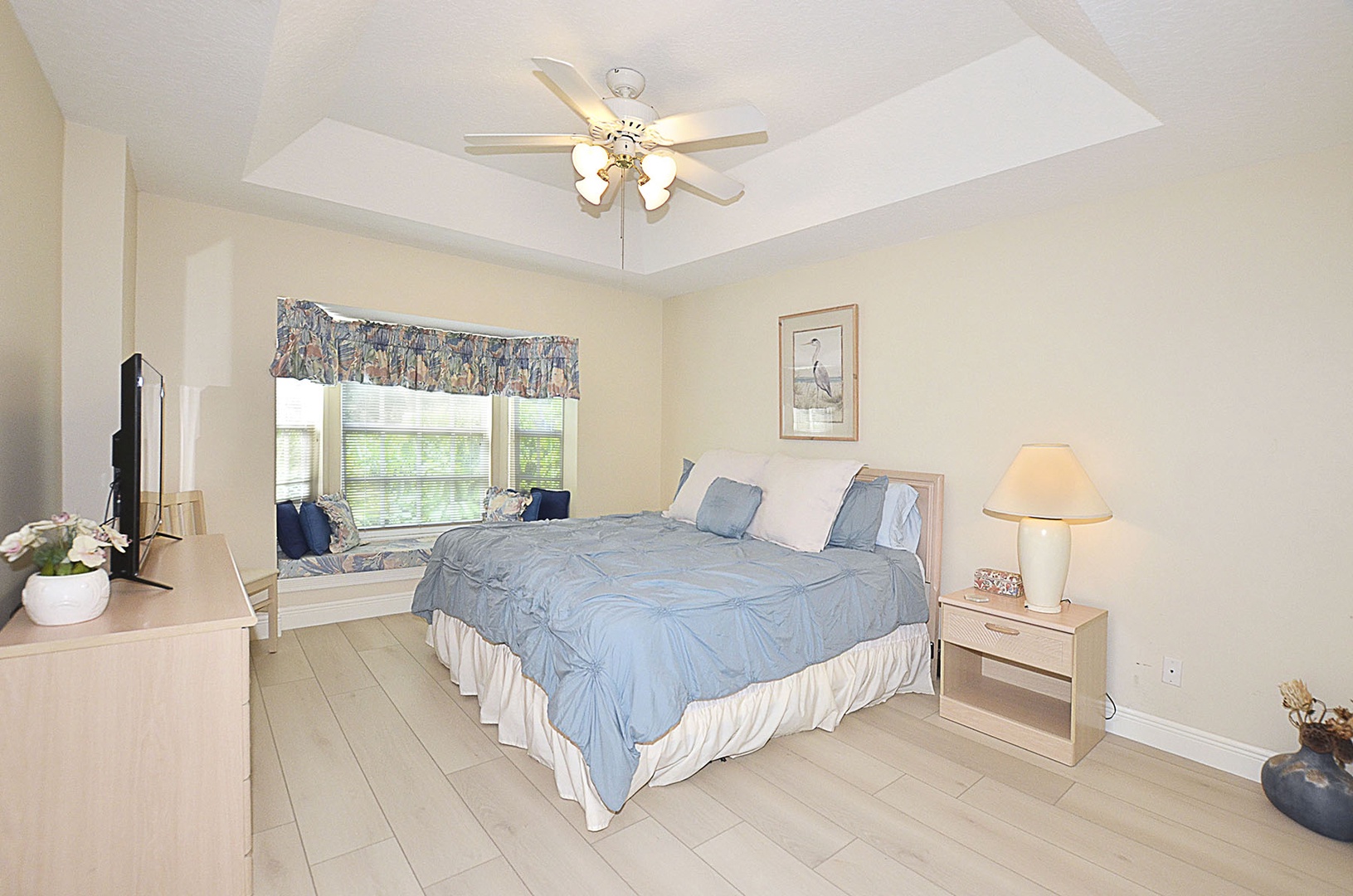 Guest Bedroom. Unwind in your serene bedroom featuring a plush king size bed.