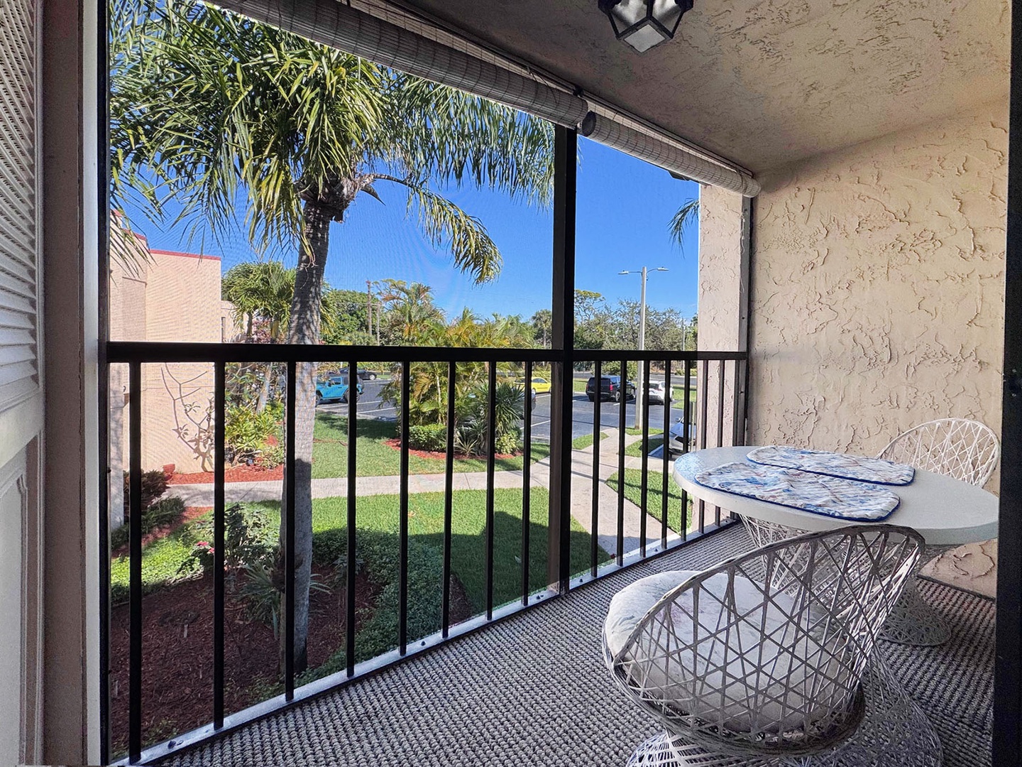 Start your mornings with coffee on your private balcony, overlooking peaceful gardens and palm trees.