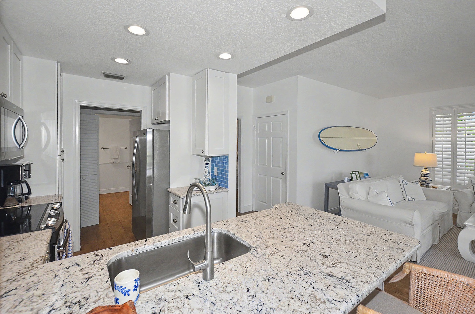 Kitchen with granite counter tops.