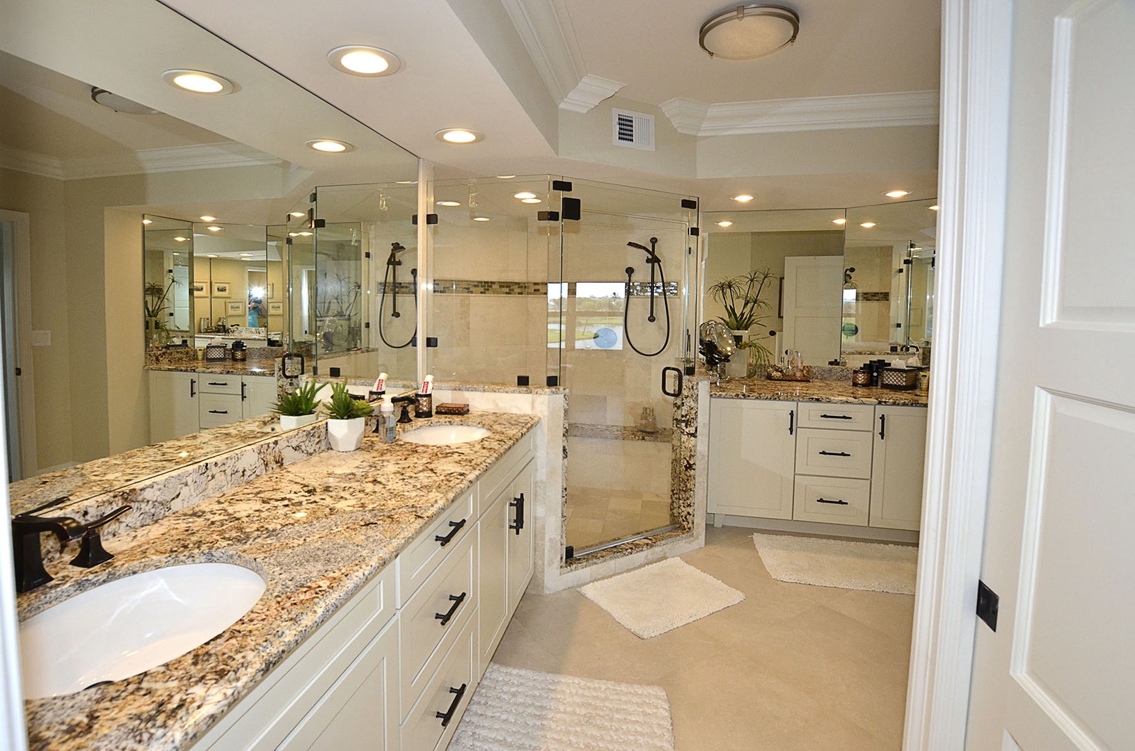 Primary ensuite bathroom with double sink  vanity