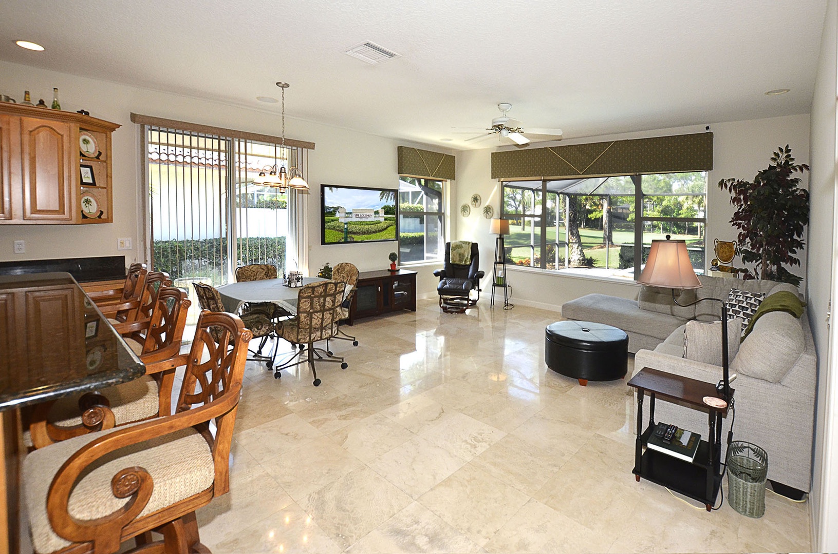 Family Room with Pool Deck Window Views