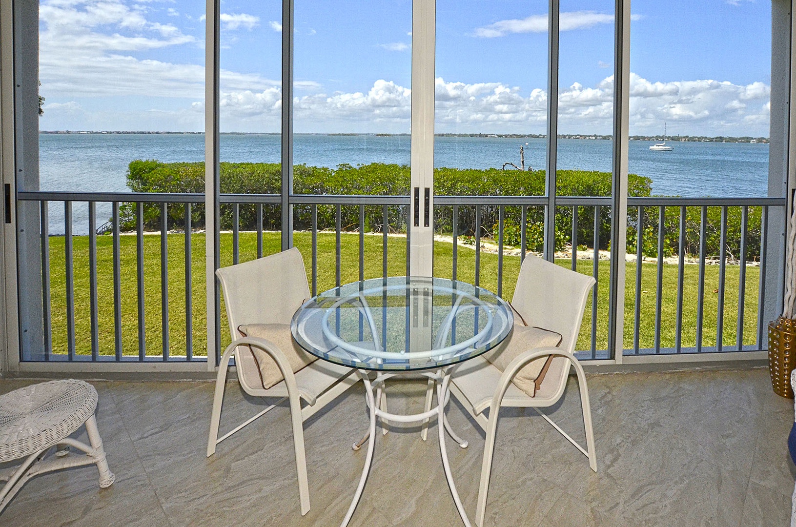 Glass enclosed Balcony overlooking the wide-water riverfront