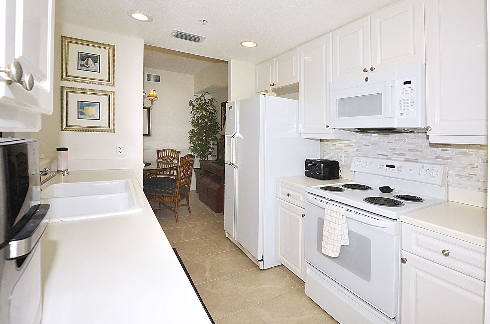 The Kitchen offers full-size appliances and ample counter space, perfect for preparing your favorite meals during your stay.