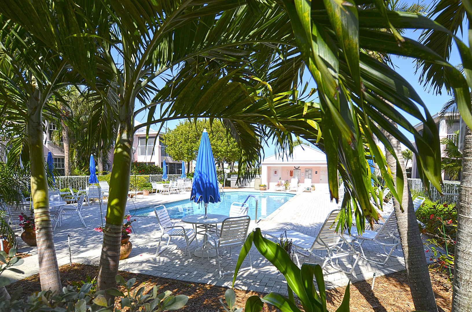 Community swimming pool where sun-drenched days blend seamlessly into relaxation.