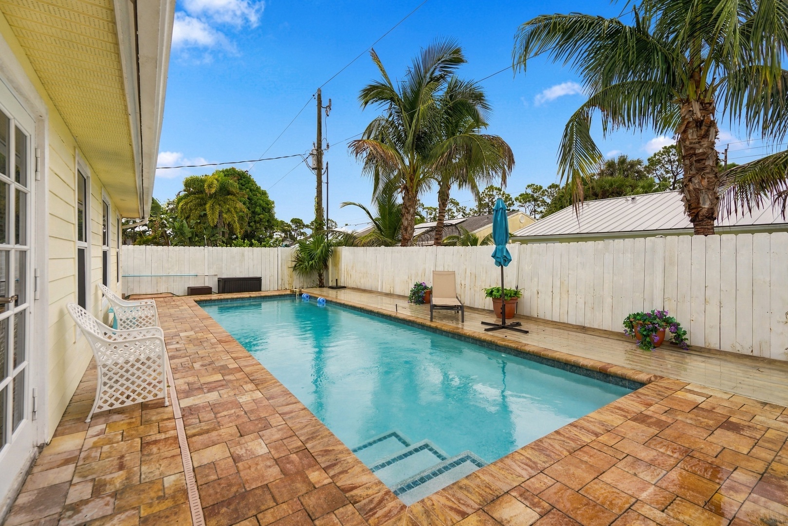 Swimming Pool with fully fenced back yard.