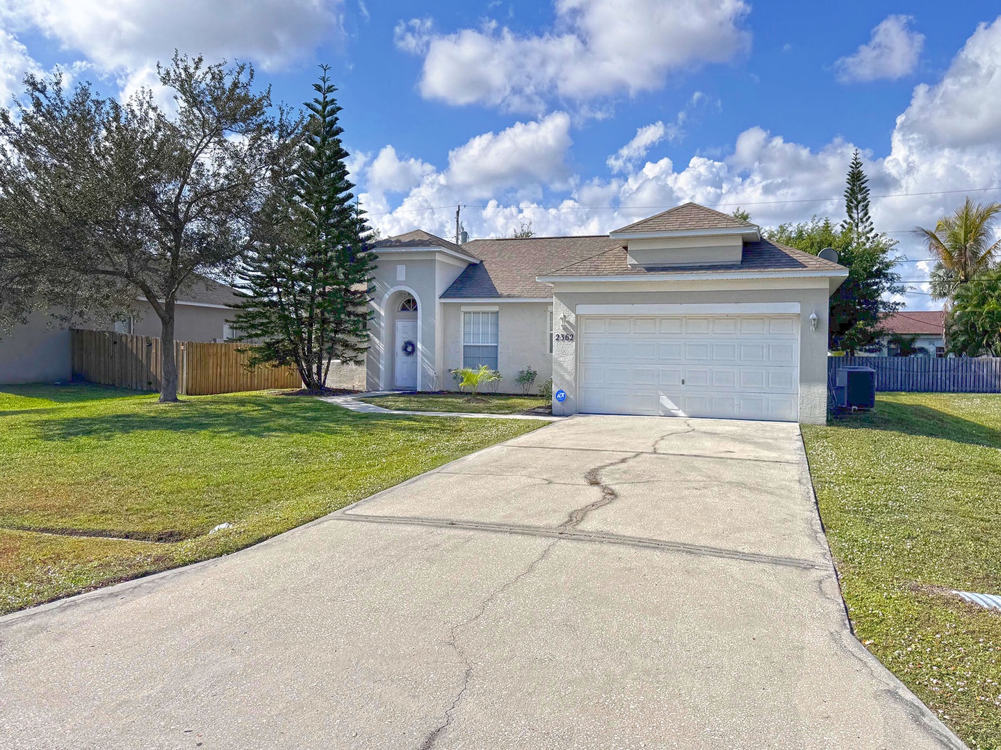Large Driveway & Enclosed Garage