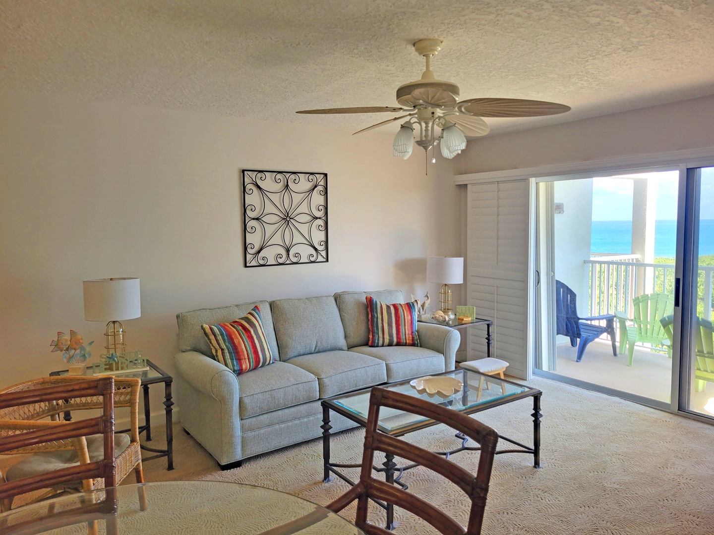 Relax in your bright living space with ocean glimpses from the balcony, perfect for morning coffee and evening unwinding.