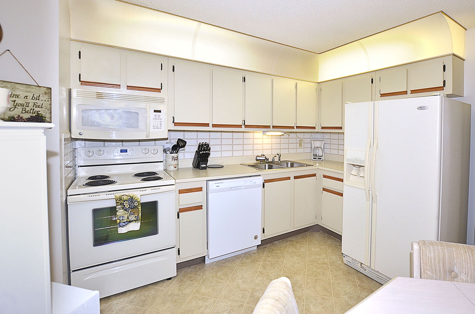 Your bright, fully equipped kitchen awaits with everything needed to whip up memorable vacation meals together.