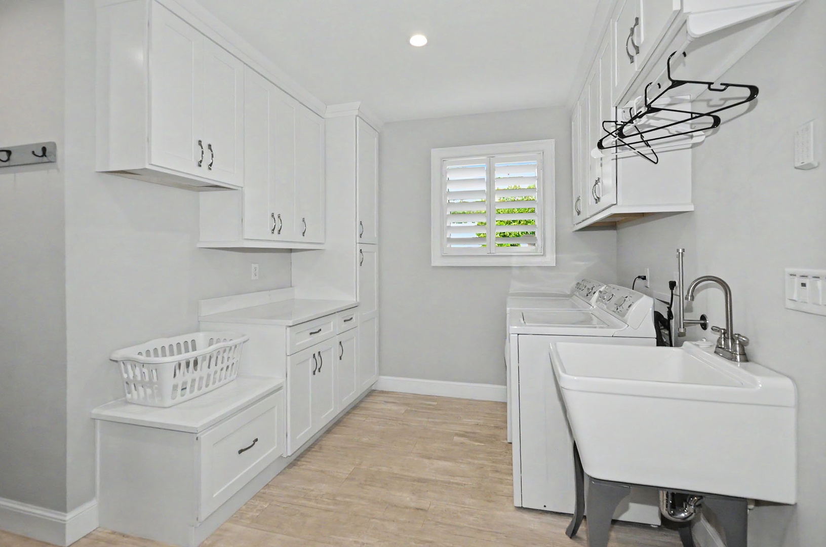 Laundry Room with washer, dryer, & sink