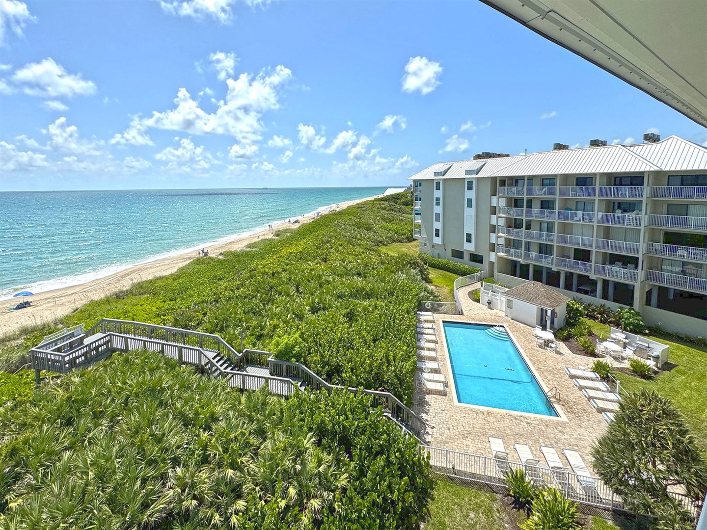 Balcony View of Resort Villas Community Swimming Pool
