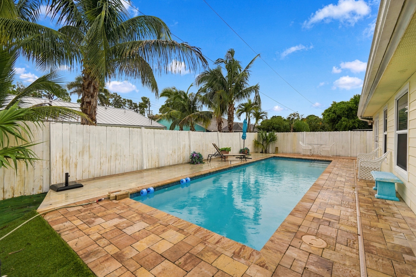 Swimming Pool with fully fenced back yard.