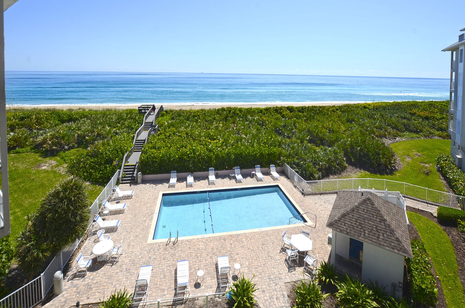 Balcony View overlooking the community pool & Oceanfront