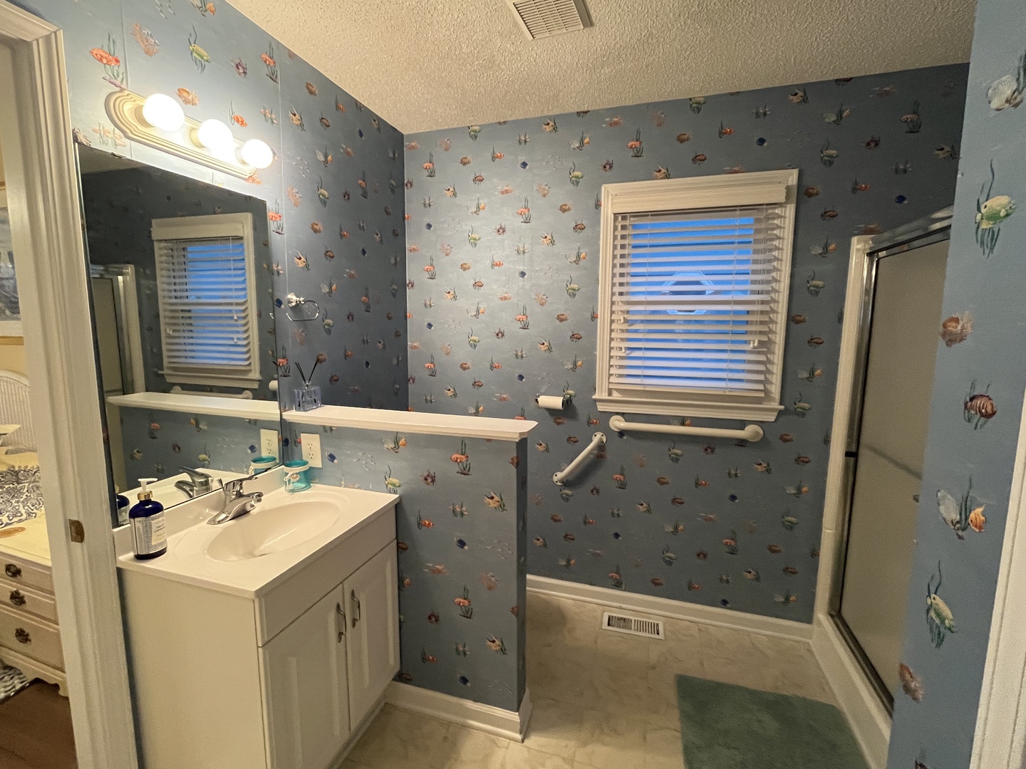bathroom 1 open to bedroom 1 and hall