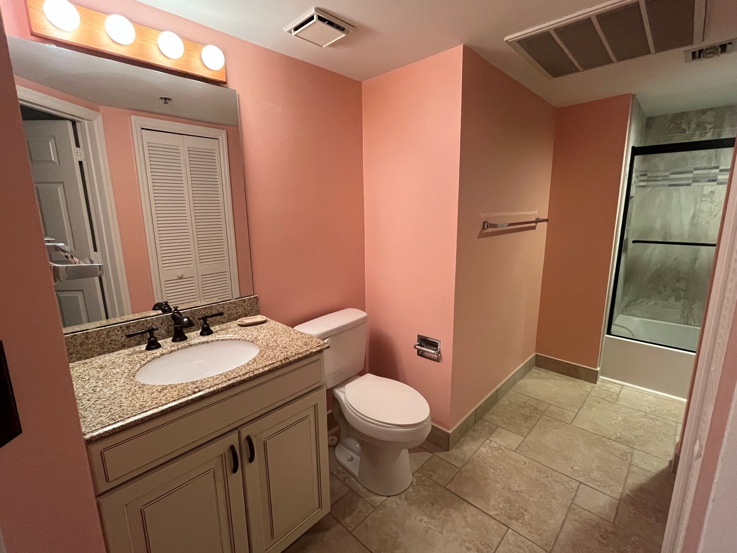 7 - bathroom open to hall and bedroom