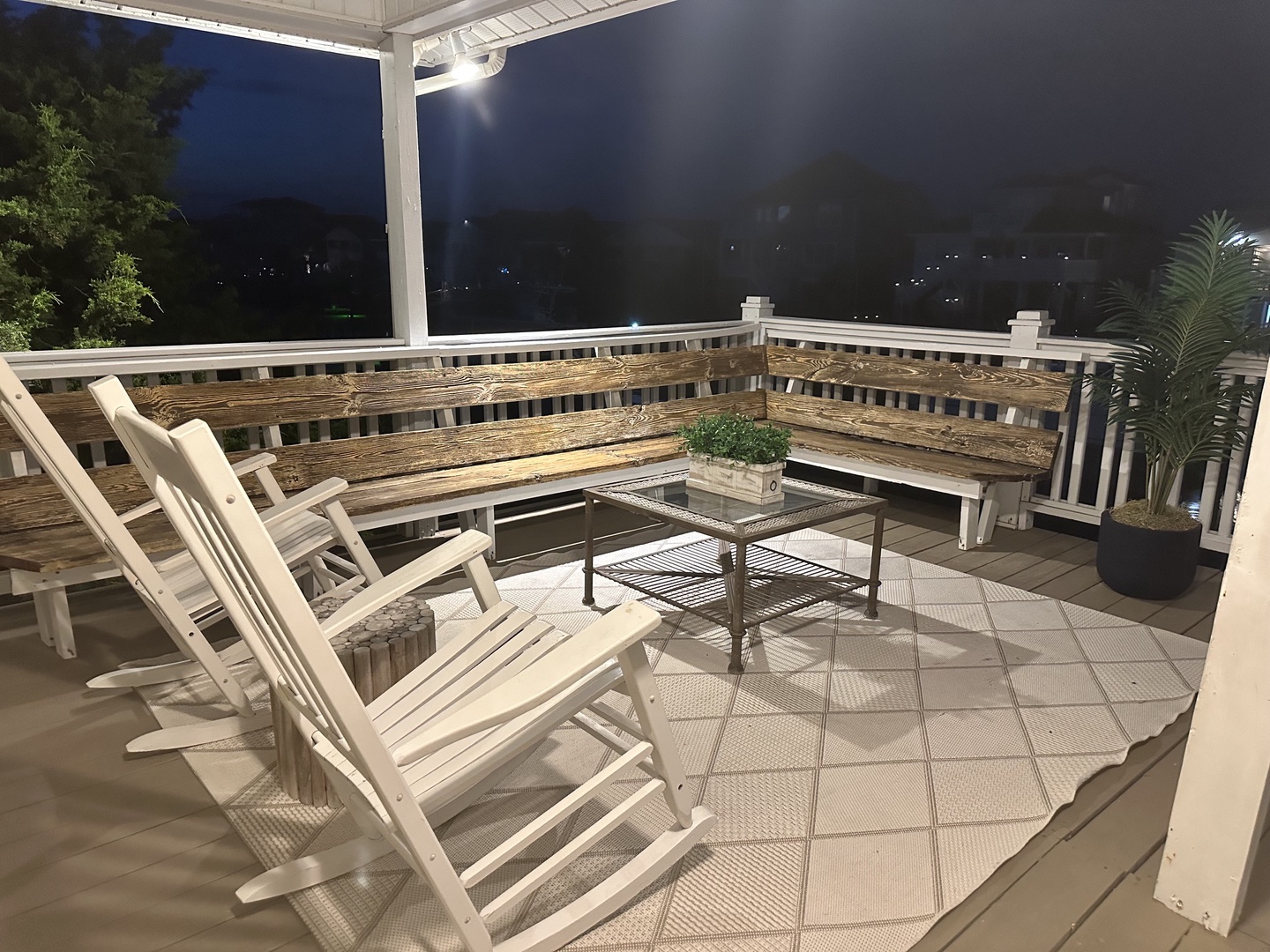 Deck built-in benches in corner with Rocking chairs