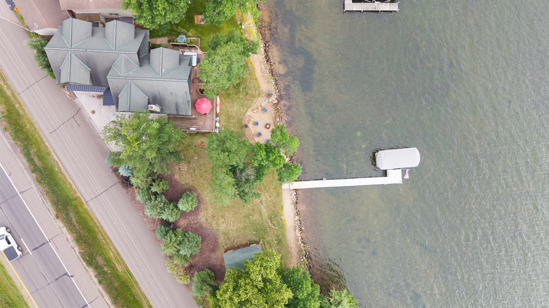Private dock and lakeside beach area.