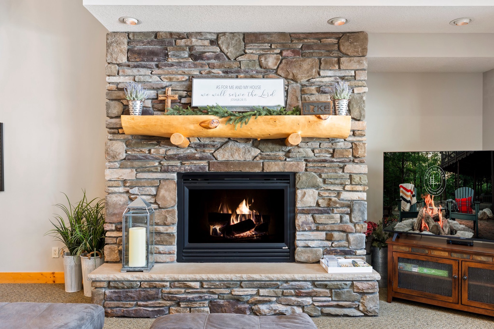 Gather around your stunning stone fireplace where crackling flames create the perfect ambiance for cozy evenings together.