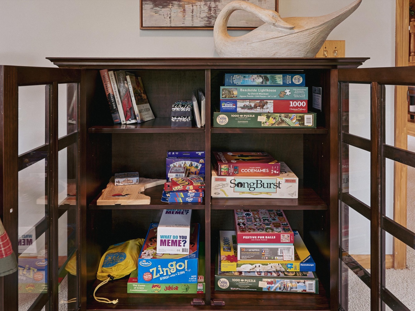 Games located in the sunroom cabinet.