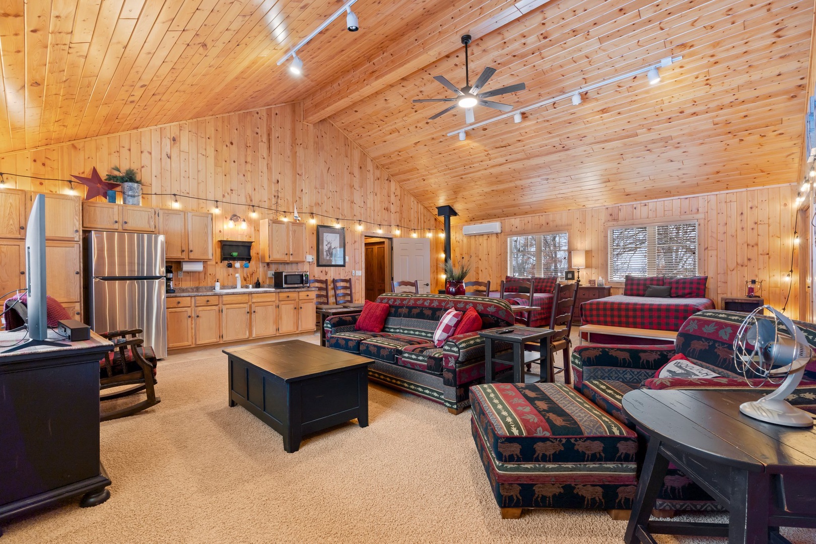 Bonus Room Above Garage with another refrigerator and small kitchen