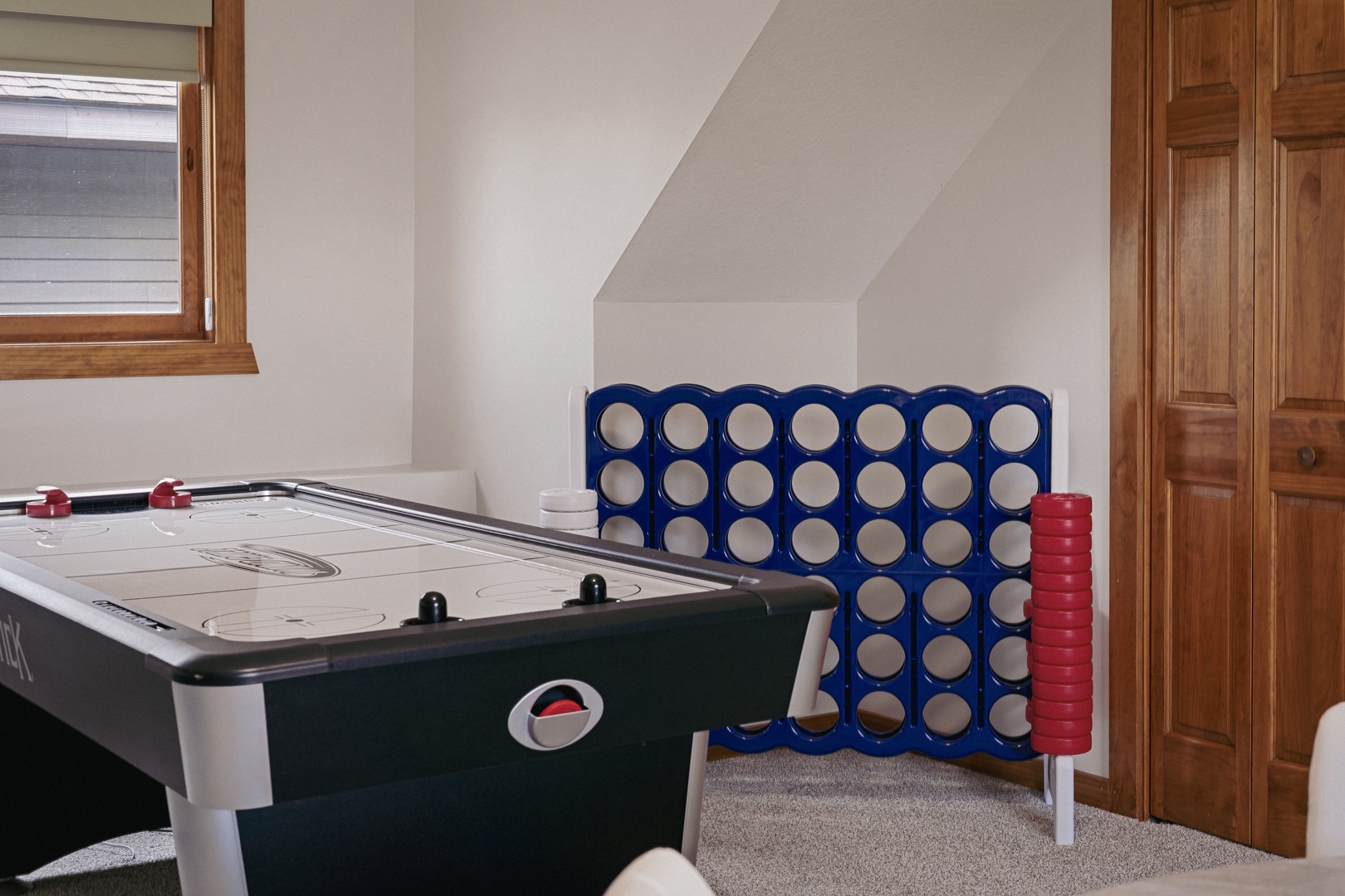 Large connect 4 game and air hockey table.