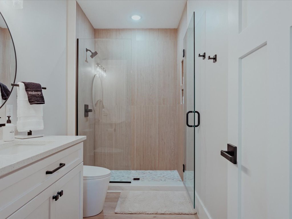 Lower level bathroom adjacent to Bedroom #1