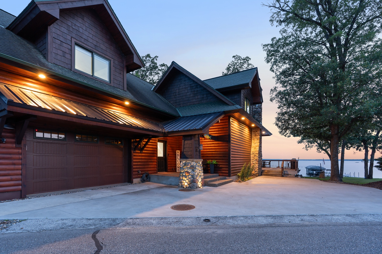 Welcoming front entrance and garage.