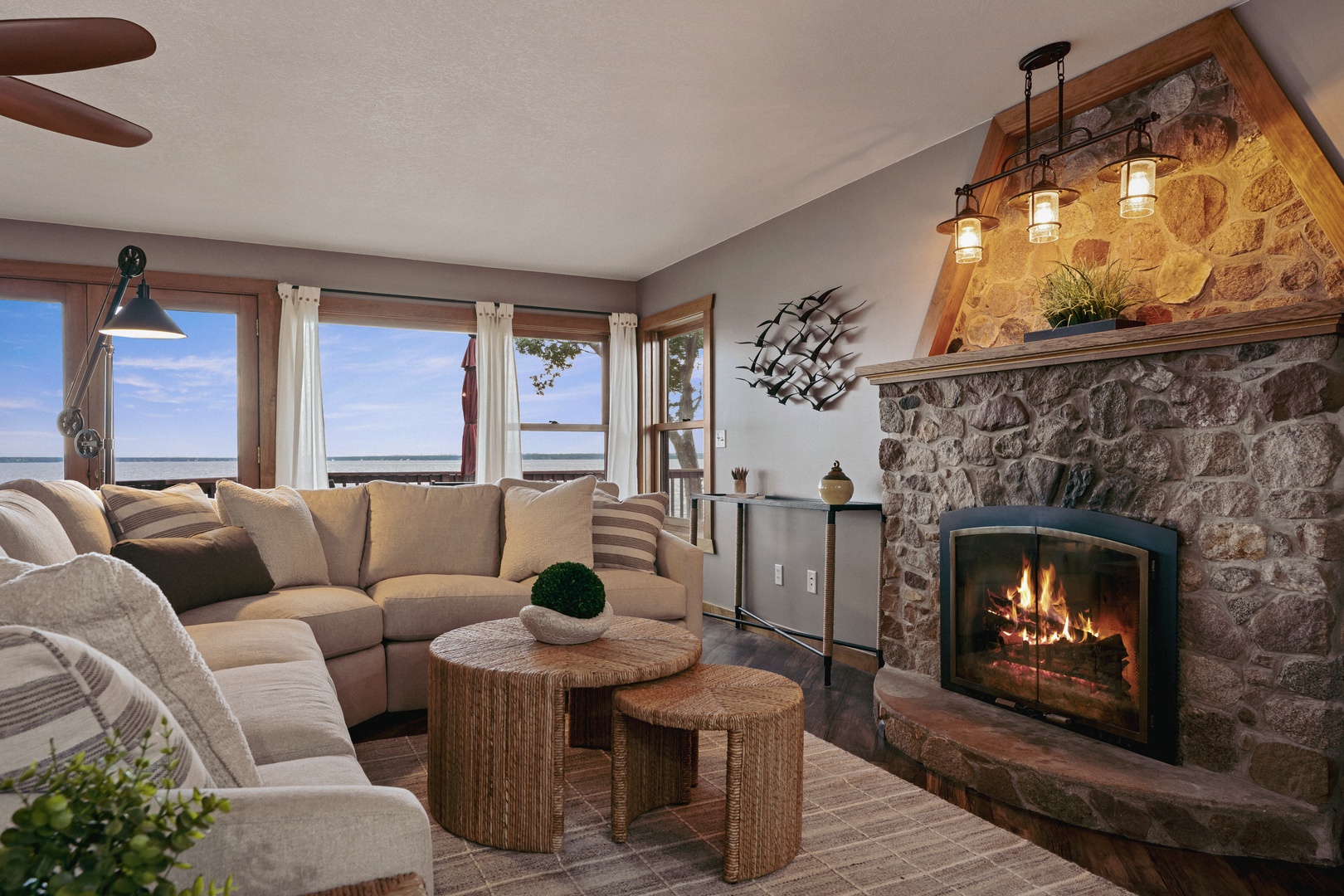 Cozy living room with a stone fireplace.