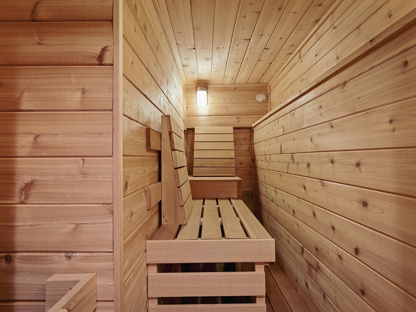 Indoor sauna on the lower level.