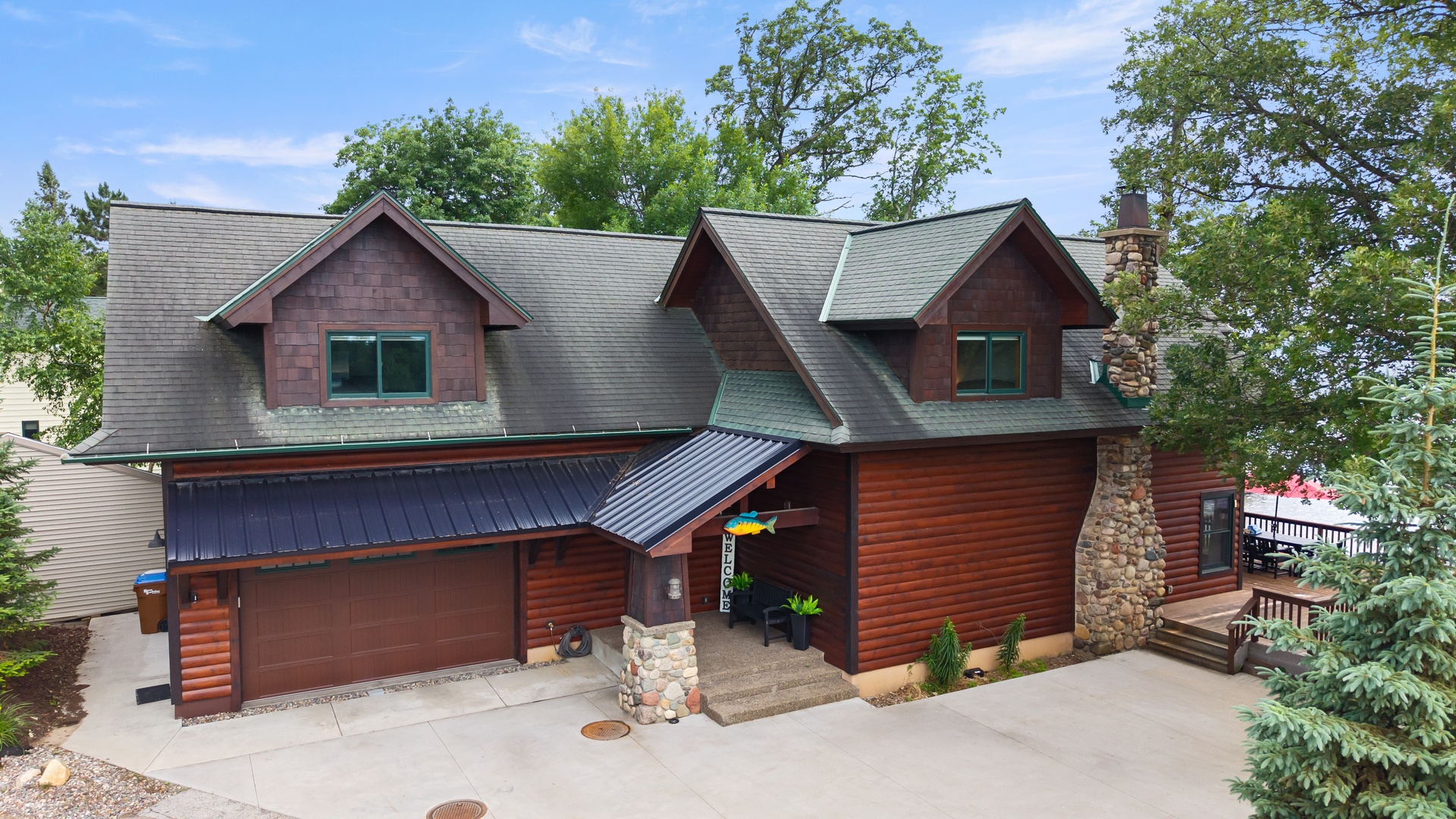 Welcoming front entrance and garage.