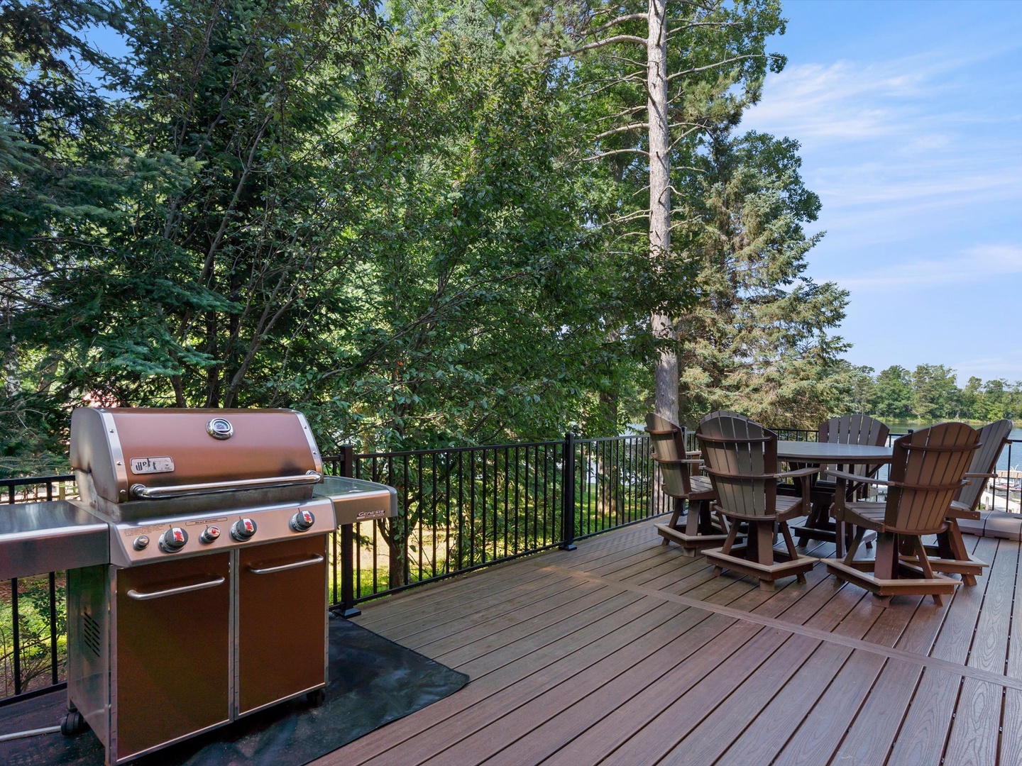 Deck with grill & patio table.