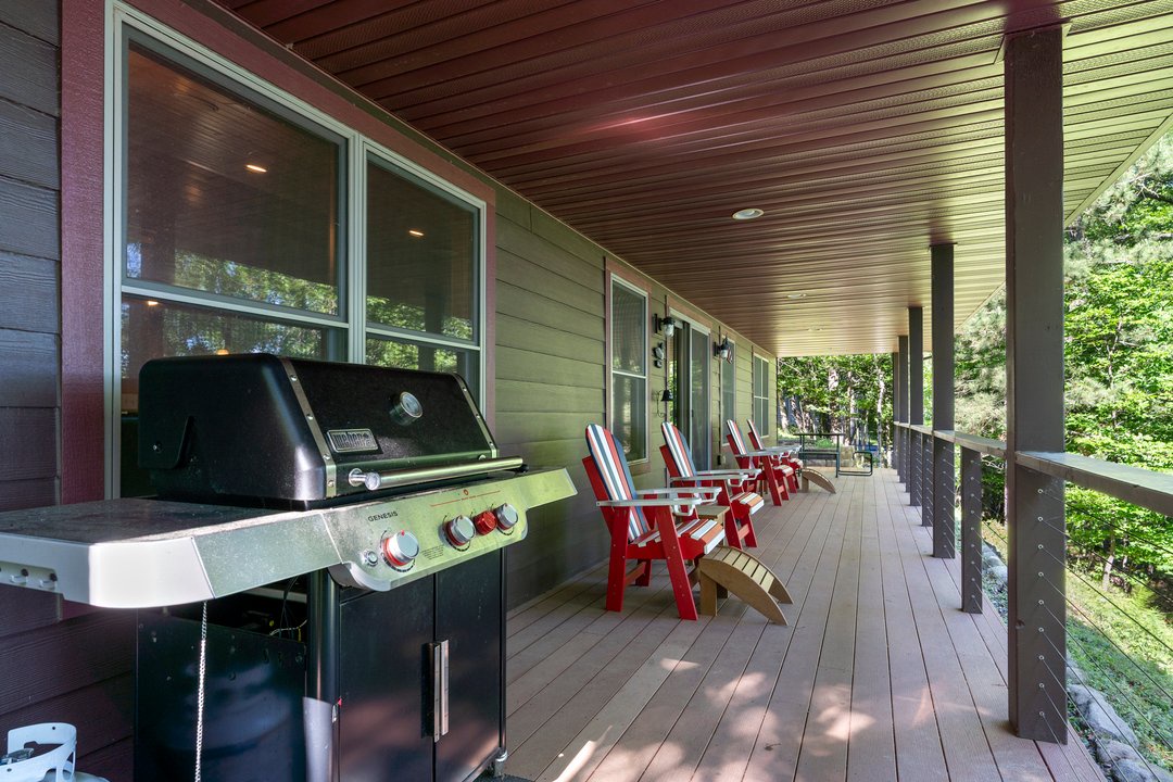 Propane Grill, cozy Adirondack seating and picnic table