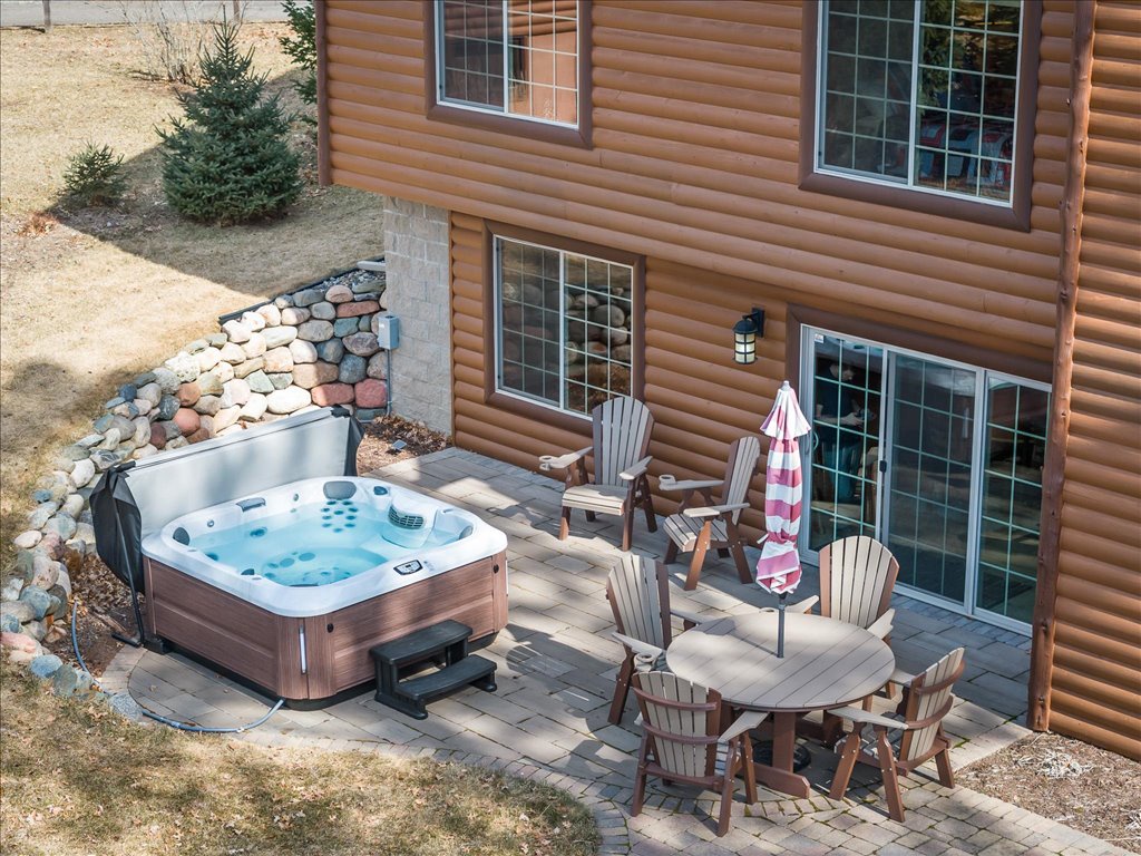 patio w jacuzzi hot tub + dining