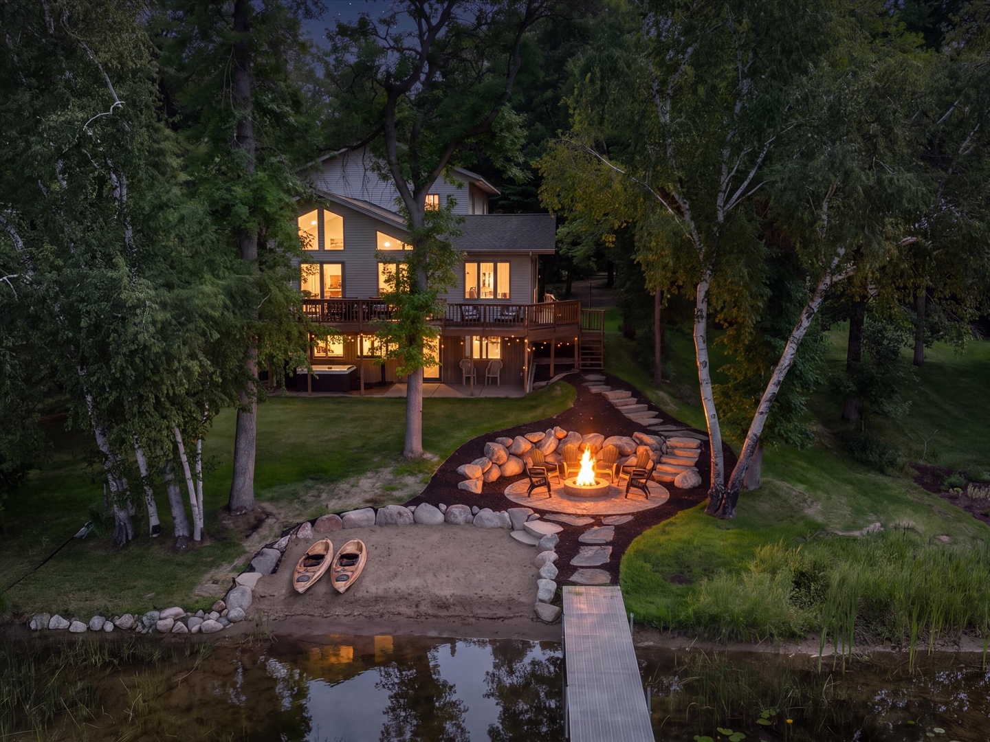 Lakeside backyard at twilight.