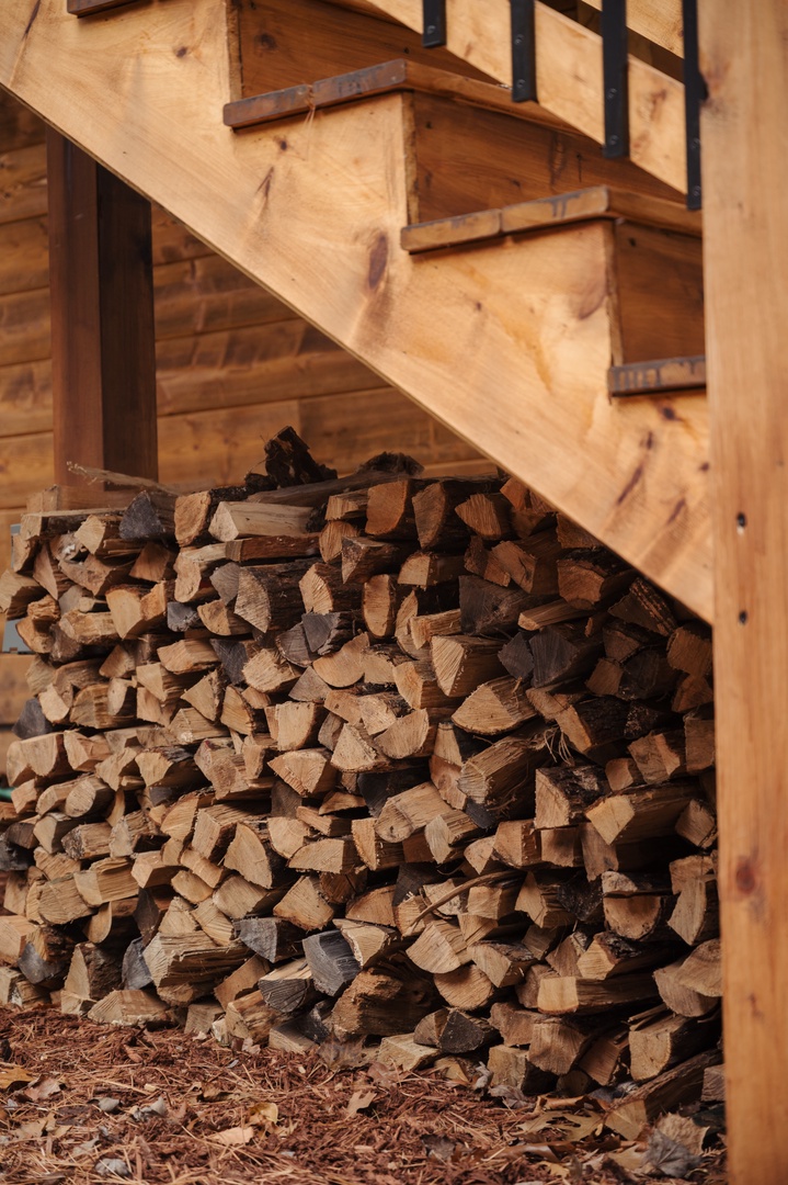 Firewood available for porch fireplace