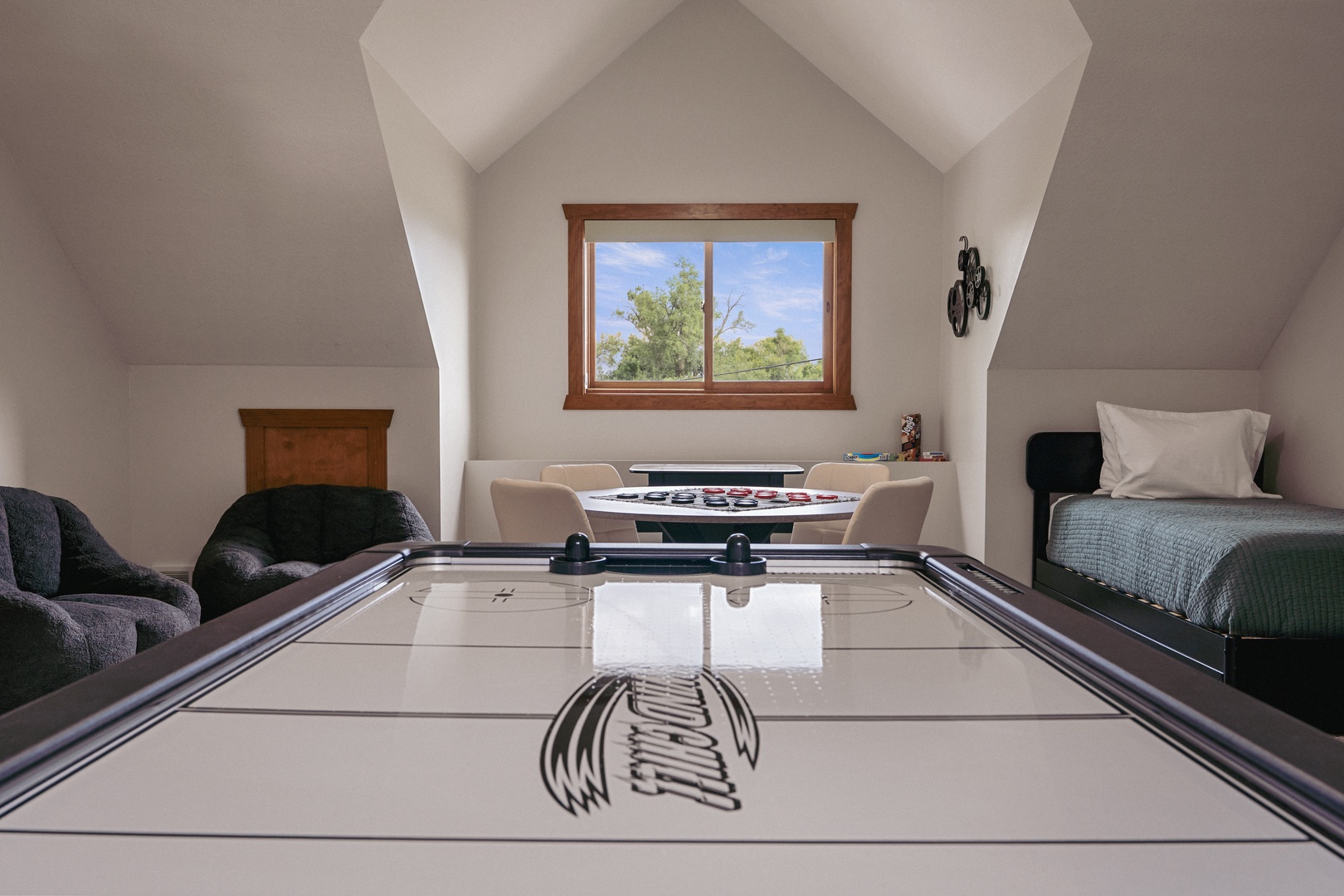 Air hockey table, games and sleeping quarters.