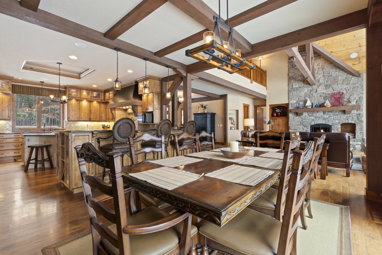 Gather around this stunning dining table where rustic charm meets luxury, creating the perfect setting for memorable meals.