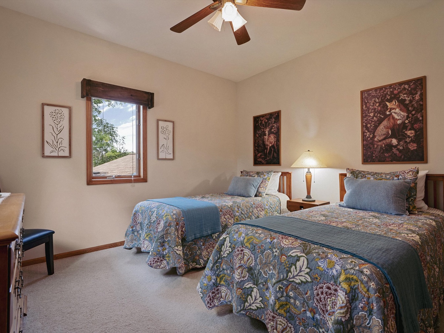 Upper level bedroom with two twin beds.