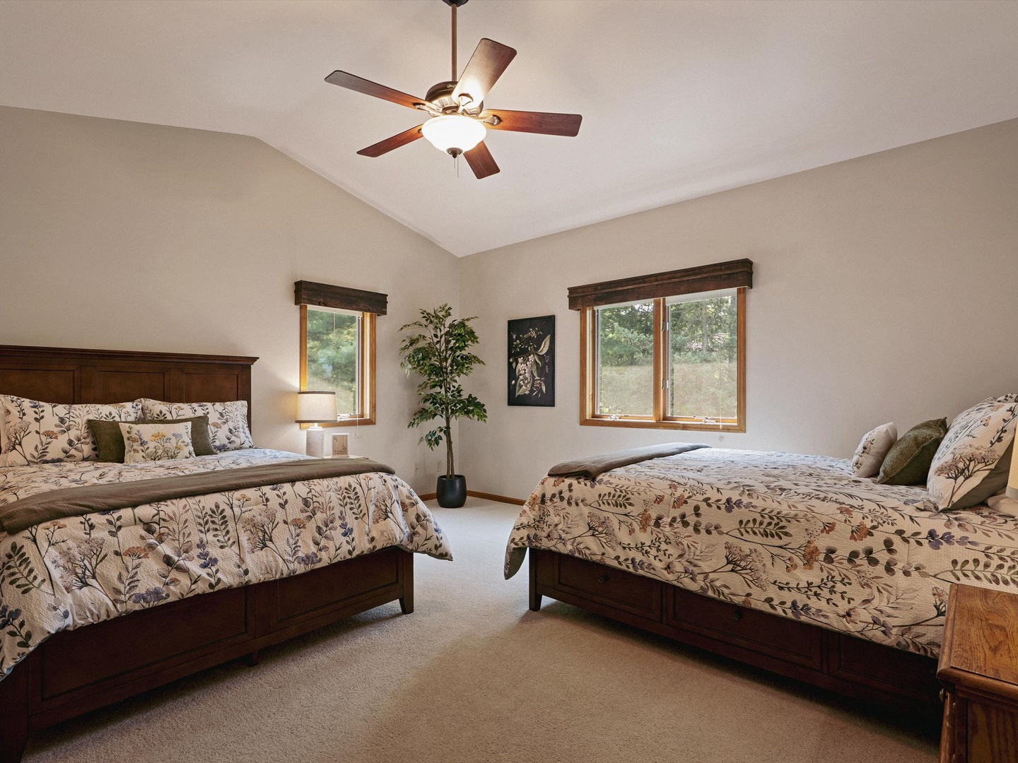 Upper level family suite with two queen beds.